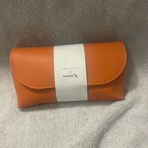 Raven & Lily American Airlines Orange Leather Amenity Kit Socks, Mask, Earplugs